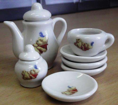 Miniature Winnie the Poo incomplete tea set.
