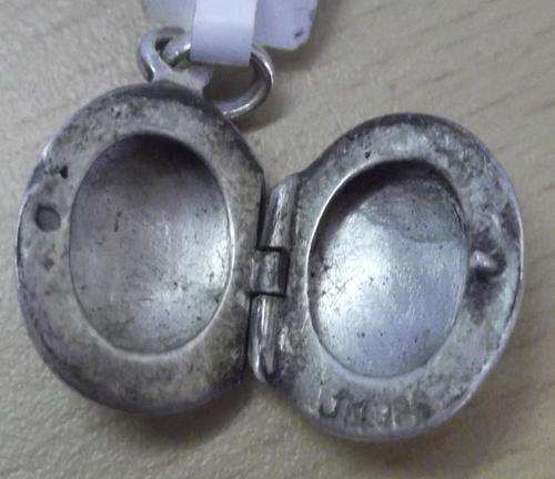 Hallmark silver locket - oval shape