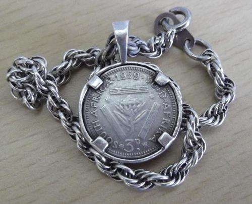 Silver bracelet with 1959 Tickey