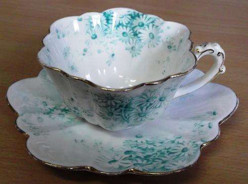 Lovely petal-shaped teacup and saucer