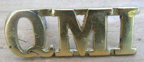 Very rare Queensland Mounted Infantry (QMI) boer war brass shoulder title 1889-1901