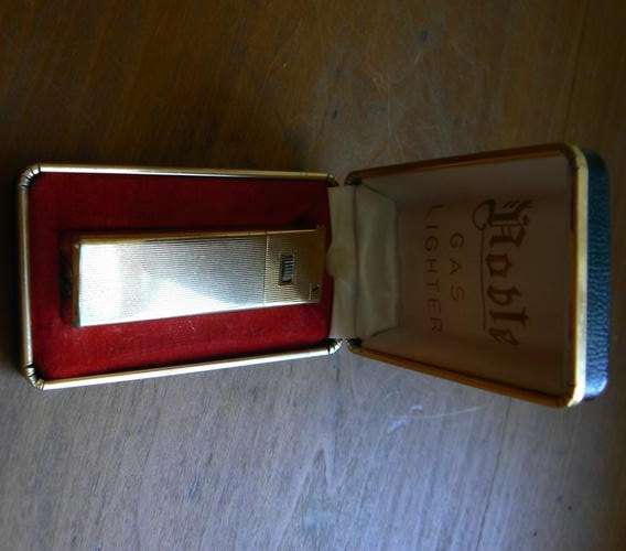Vintage Noble gas/flint lighter in original box, working
