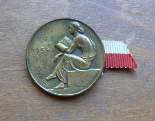 1954 Huguenin Locle Swiss brass badge/medallion