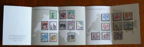 Switzerland 1973-1984 PTT Souvenir German booklet villages and folk customs with 21 MNH stamps