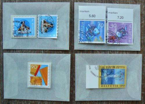 Switzerland 2001 lot of 30 officially cancelled stamps and sheet of 8 + blocks + 13 FDCs, CV$220+