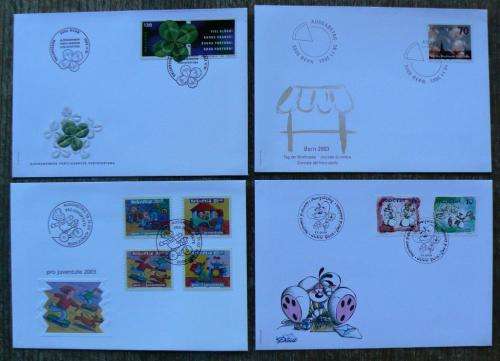 Switzerland 2003 lot of 33 officially cancelled stamps, blocks & sheets, 21FDCs, 5 postcards + extra