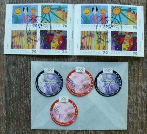 Switzerland 2000 lot of 36 officially cancelled stamps, 4 booklets + card with block of 4 - CV$150+