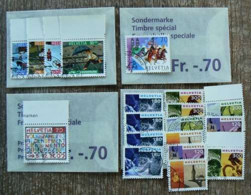 Switzerland 2000 lot of 36 officially cancelled stamps, 4 booklets + card with block of 4 - CV$150+