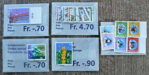 Switzerland 2000 lot of 36 officially cancelled stamps, 4 booklets + card with block of 4 - CV$150+
