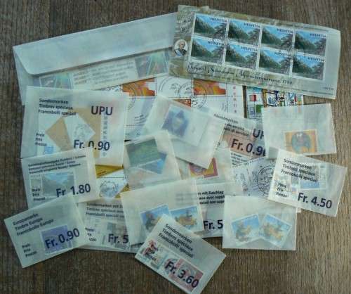 Switzerland 1999 lot of 30 officially cancelled stamps + blocks, strips and sheets - CV$170+
