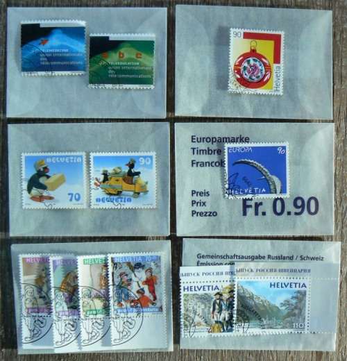 Switzerland 1999 lot of 30 officially cancelled stamps + blocks, strips and sheets - CV$170+
