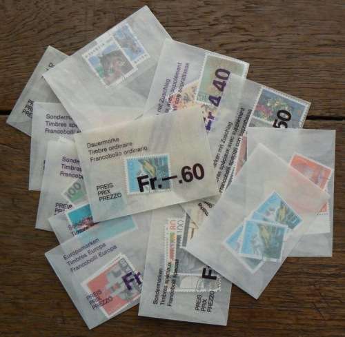 Switzerland 1993 lot of 32 officially cancelled stamps + pair in original envelopes - CV$70+