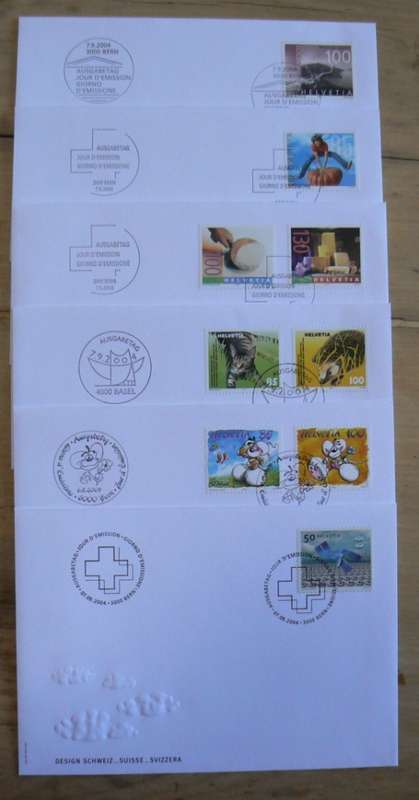 Switzerland 2004 lot of 31 officially cancelled stamps + blocks & sheets + 24 FDCs + 7 cards