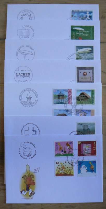 Switzerland 2004 lot of 31 officially cancelled stamps + blocks & sheets + 24 FDCs + 7 cards
