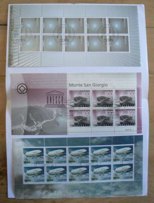 Switzerland 2004 lot of 31 officially cancelled stamps + blocks & sheets + 24 FDCs + 7 cards