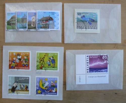 Switzerland 2004 lot of 31 officially cancelled stamps + blocks & sheets + 24 FDCs + 7 cards