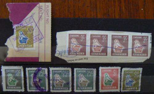 Lot of 11 Zimbabwe revenue stamps, used