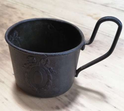 Antique child`s embossed metal cup with `Old English` handle - pre-1850