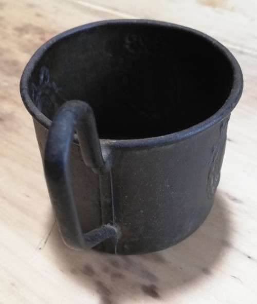 Antique child`s embossed metal cup with `Old English` handle - pre-1850