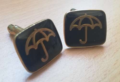 Pair of vintage Santam cufflinks - black with gold umbrella