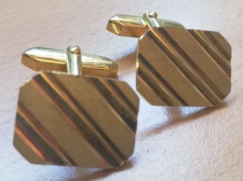 Classical vintage gold-coloured cufflinks