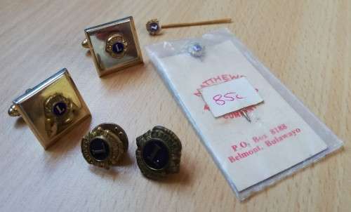 Lot of Lions Club International badges, pins and cufflinks