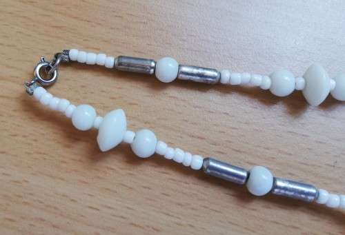 Pretty vintage beaded necklace with metal pieces between beads