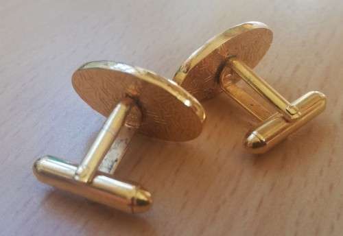 Pair of vintage gold-coloured cufflinks, MMI logo