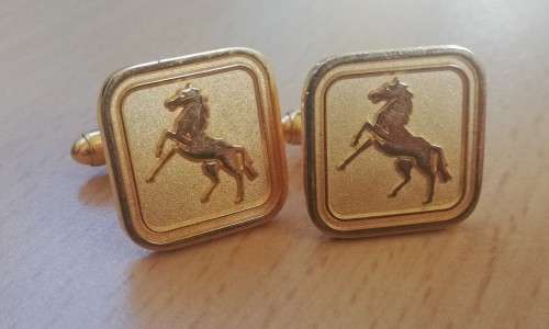 Pair of vintage gold-plated cufflinks with stallion motif