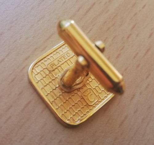 Pair of vintage gold-plated cufflinks with stallion motif