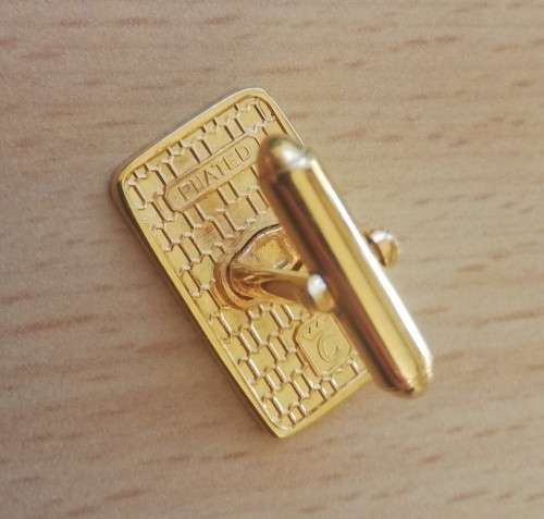 Pair of vintage gold-plated cufflinks with WR logo