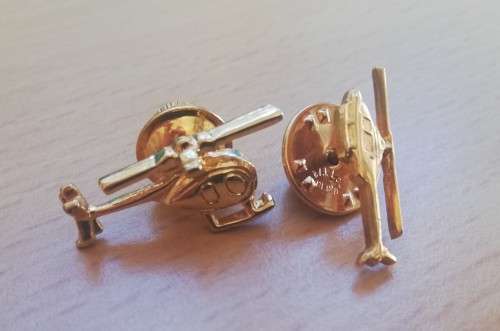 Pair of vintage gold-plated helicopter pin badges