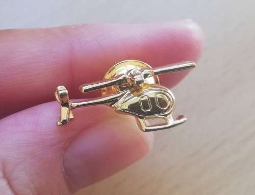 Pair of vintage gold-plated helicopter pin badges