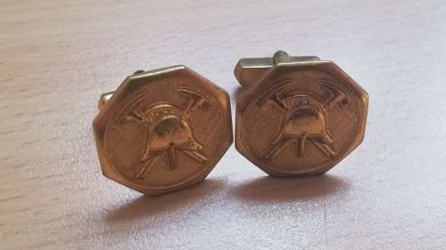 Pair of vintage gold-plated cufflinks - looks like a mining logo