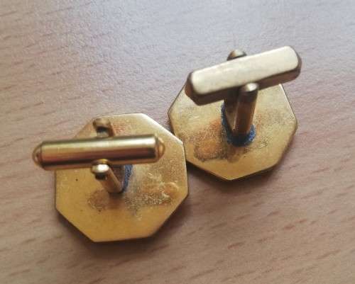 Pair of vintage gold-plated cufflinks - looks like a mining logo