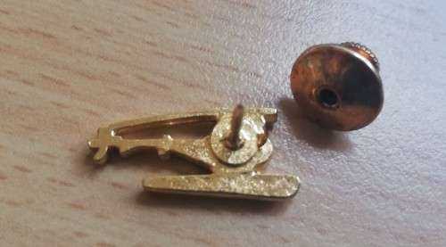 Pair of vintage gold-plated helicopter pins