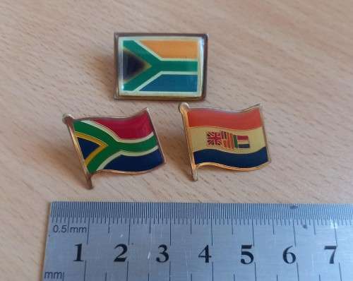 Great lot of 13 vintage South African lapel pin badges, including Voortrekker Monument