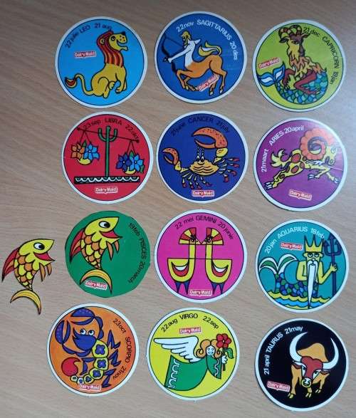 Nearly full set of Dairy Maid zodiac card stickers, 1970s