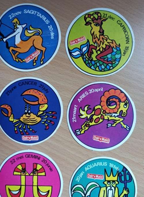 Nearly full set of Dairy Maid zodiac card stickers, 1970s