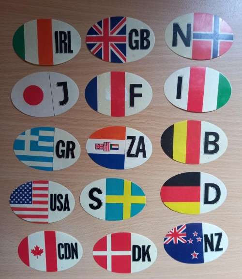 Vintage lot of 15 Shell promotion international car license stickers from the 1970s