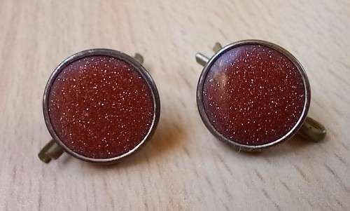 Pair of antique sunstone cufflinks / lapel pieces
