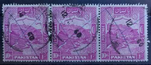 Pakistan 1957 R10 strip of 3 + single used 13 1/2 perf