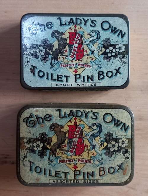 The Lady`s Own pair of pin boxes metal tins - one with contents