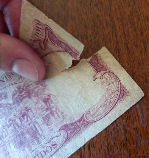 1963  Angola 100 Escudos, with tear