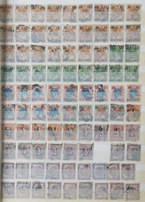Netherlands Indies stamp album with more than 1 000 used stamps 1870 onwards