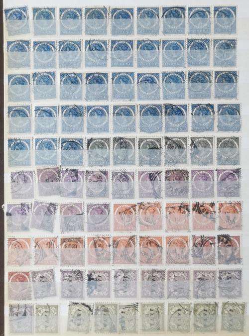 Netherlands Indies stamp album with more than 1 000 used stamps 1870 onwards