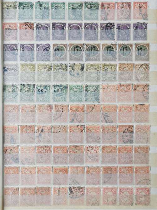 Netherlands Indies stamp album with more than 1 000 used stamps 1870 onwards