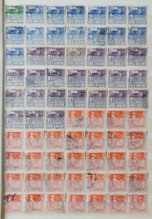 Netherlands Indies stamp album with more than 1 000 used stamps 1870 onwards
