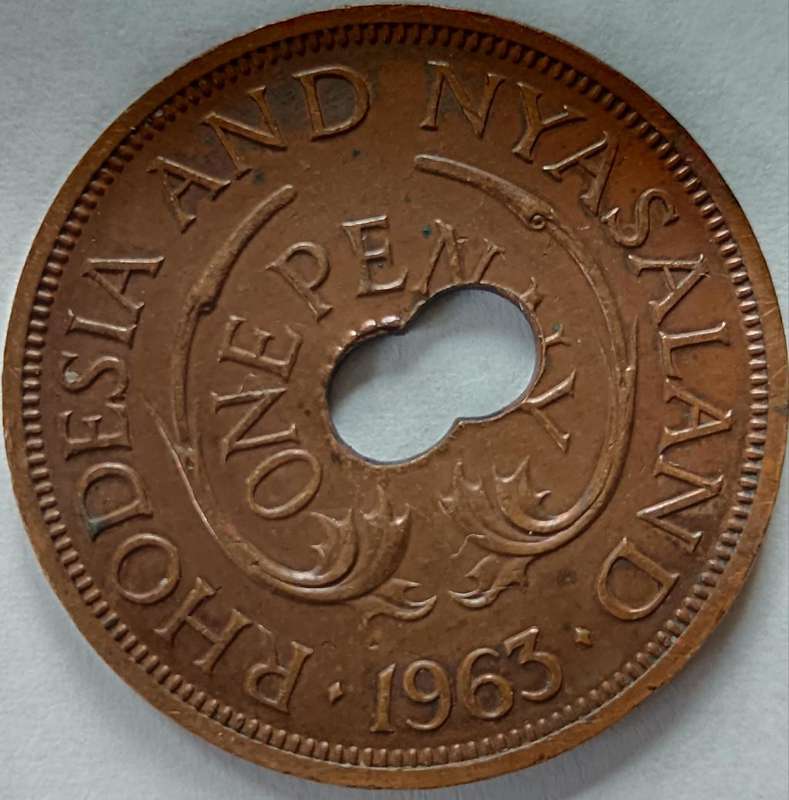 Rhodesia & Nyasaland 1 Penny 1963 error strike double hole