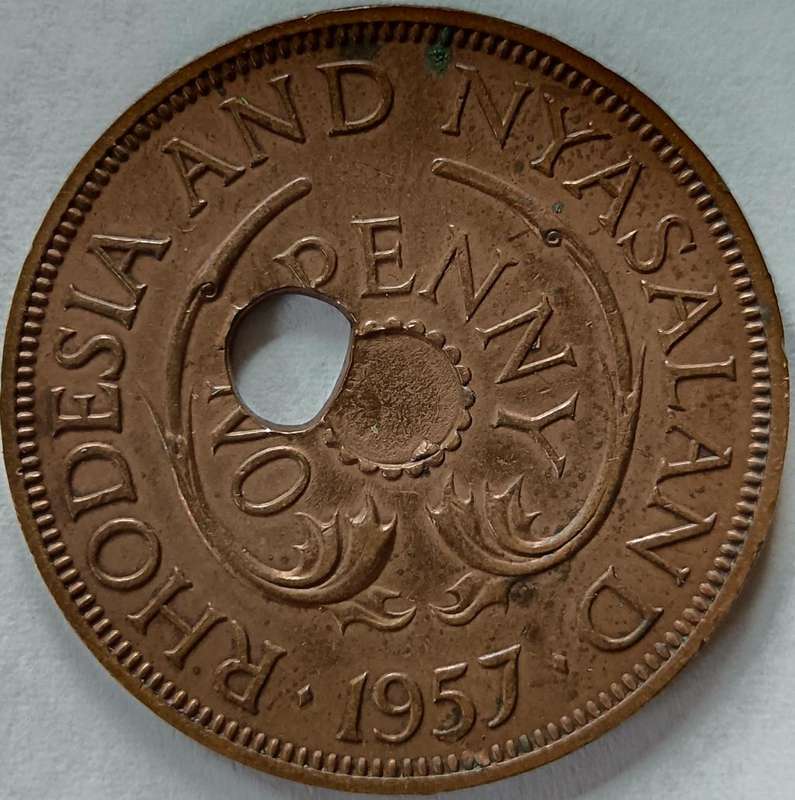 Rhodesia & Nyasaland 1 Penny 1957 error strike off-centre hole